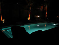 Image of an In-ground Fiberglass Pool Installation at Night in the GTA